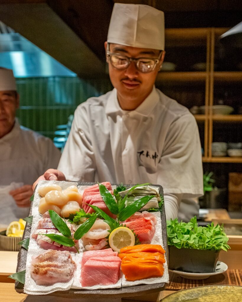 Kyle Kim showcasing fresh fish