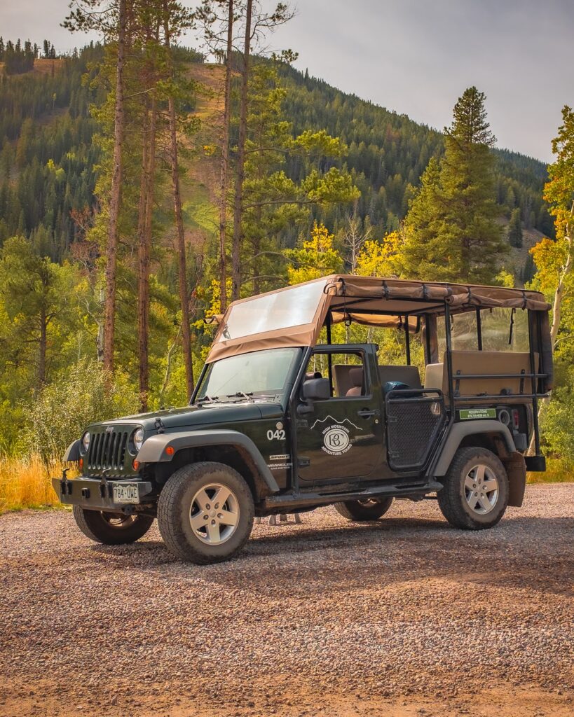 The guided 4x4 tour takes place in a covered jeep
