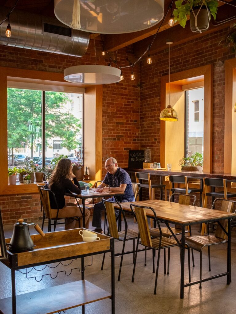 Seating area at Convivio Cafe: Downtown | Photo: Laura/New Denizen