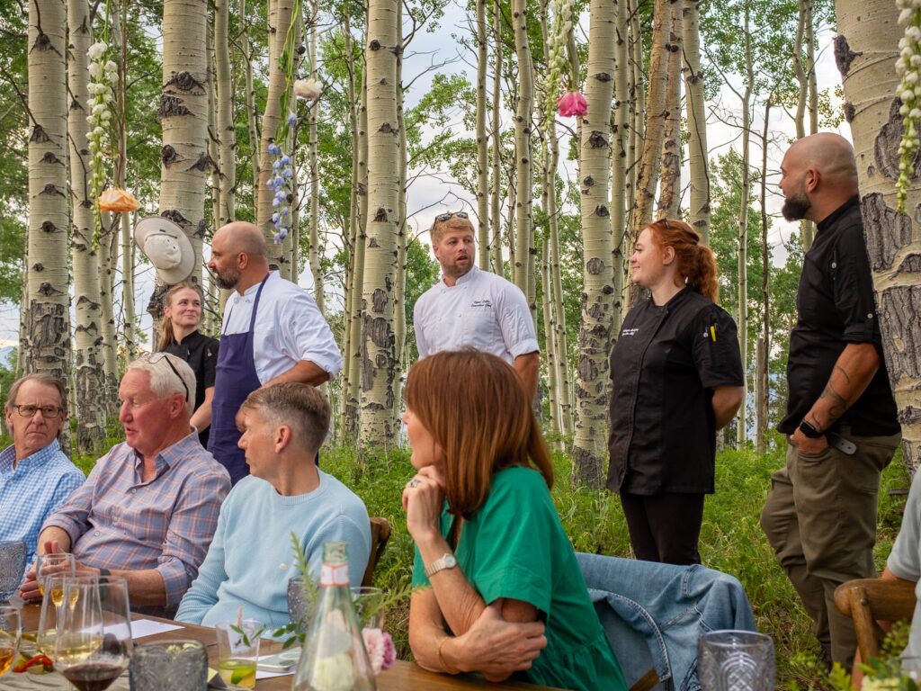 Chefs address guests at Alpine Table dinner
