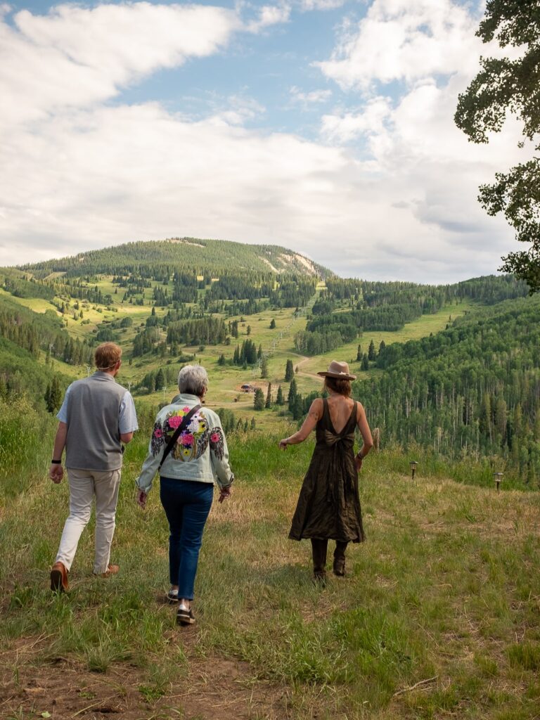 Guests walk to table at Alpine Table dinner